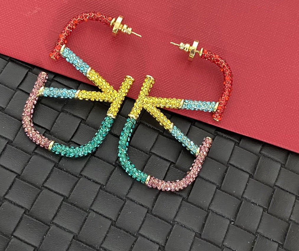 Val rainbow encrusted hoops