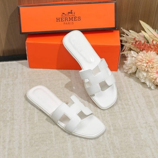 WHITE ORAN SLIDES
