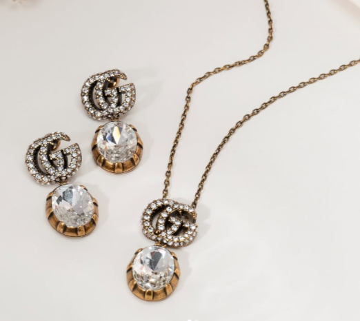 GG CRYSTAL PENDANT + EARRING