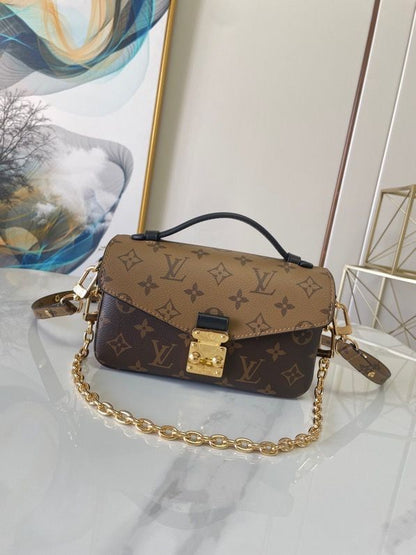 LV Pochette Metis East West Monogram Empreinte Top Handle Shoulder Bag