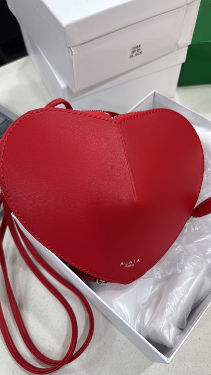 ALAIA heart-shaped SLING