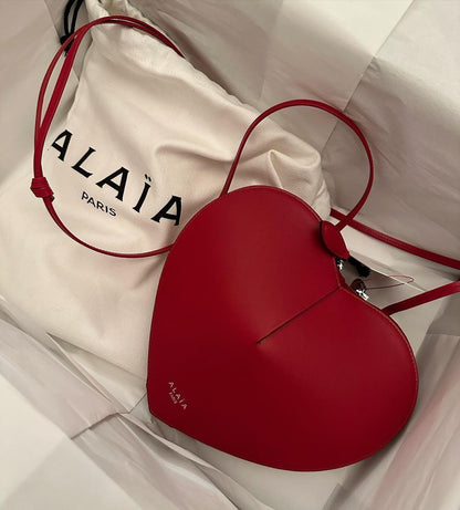 ALAIA heart-shaped SLING