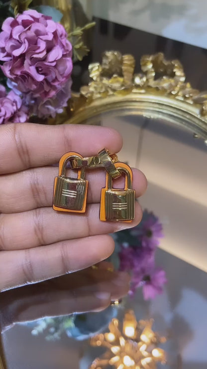 H ORANGE LOCK EARRING