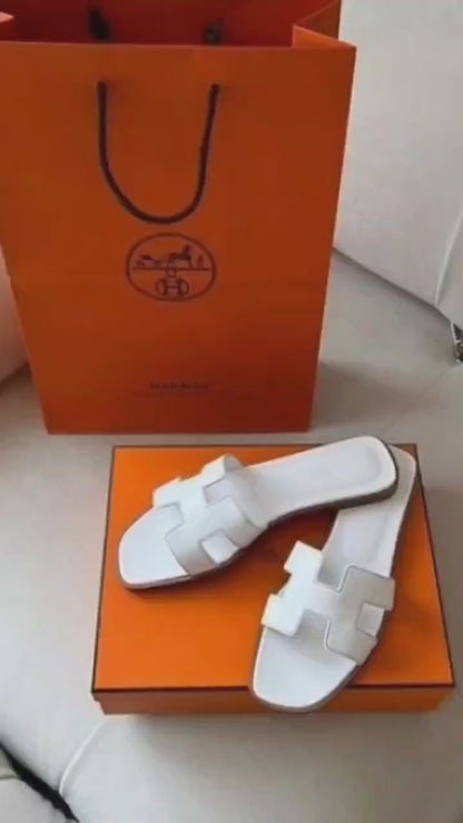 WHITE ORAN SLIDES