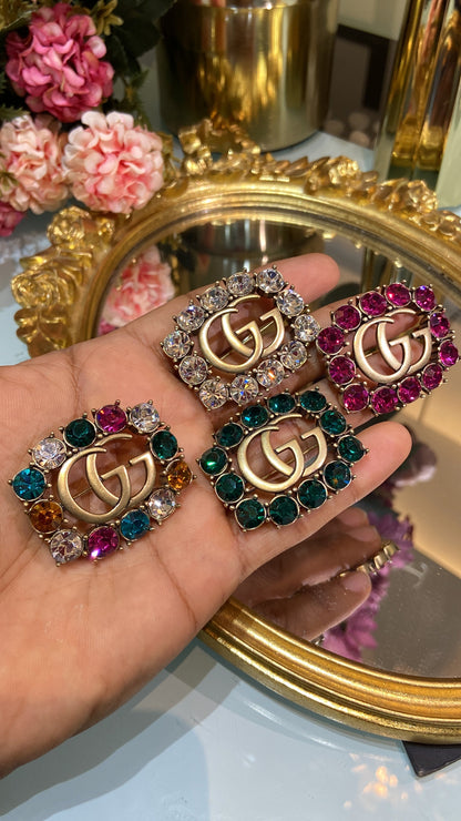 GG stone brooch