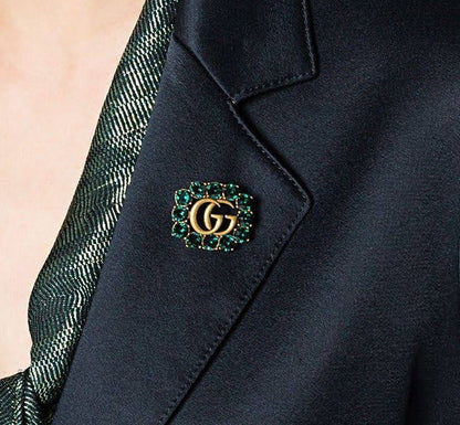 GG stone brooch